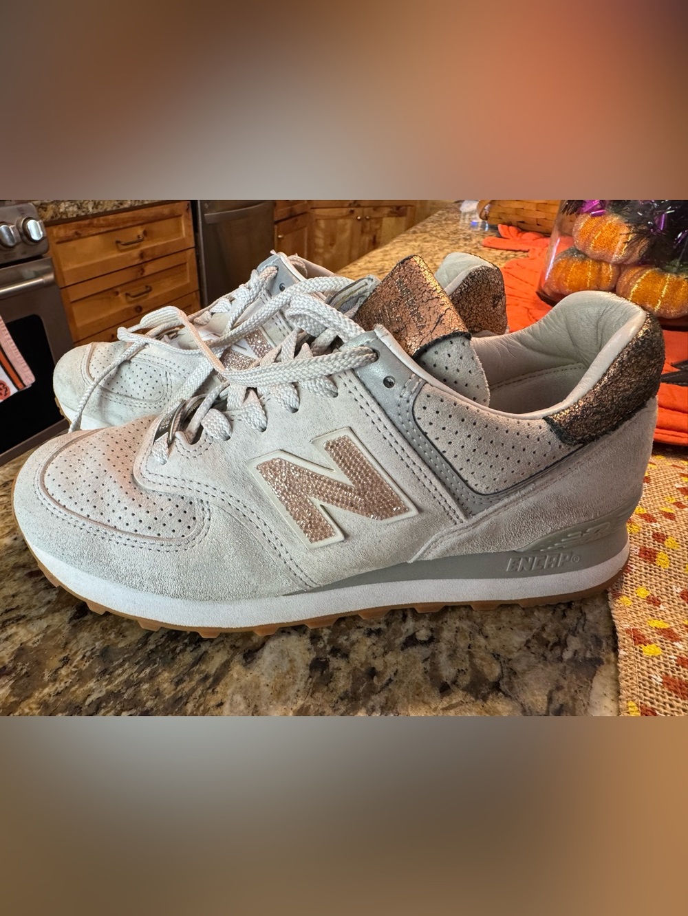 New Balance Women's 8 1/2 like new 574 rose gold grey suede worn once